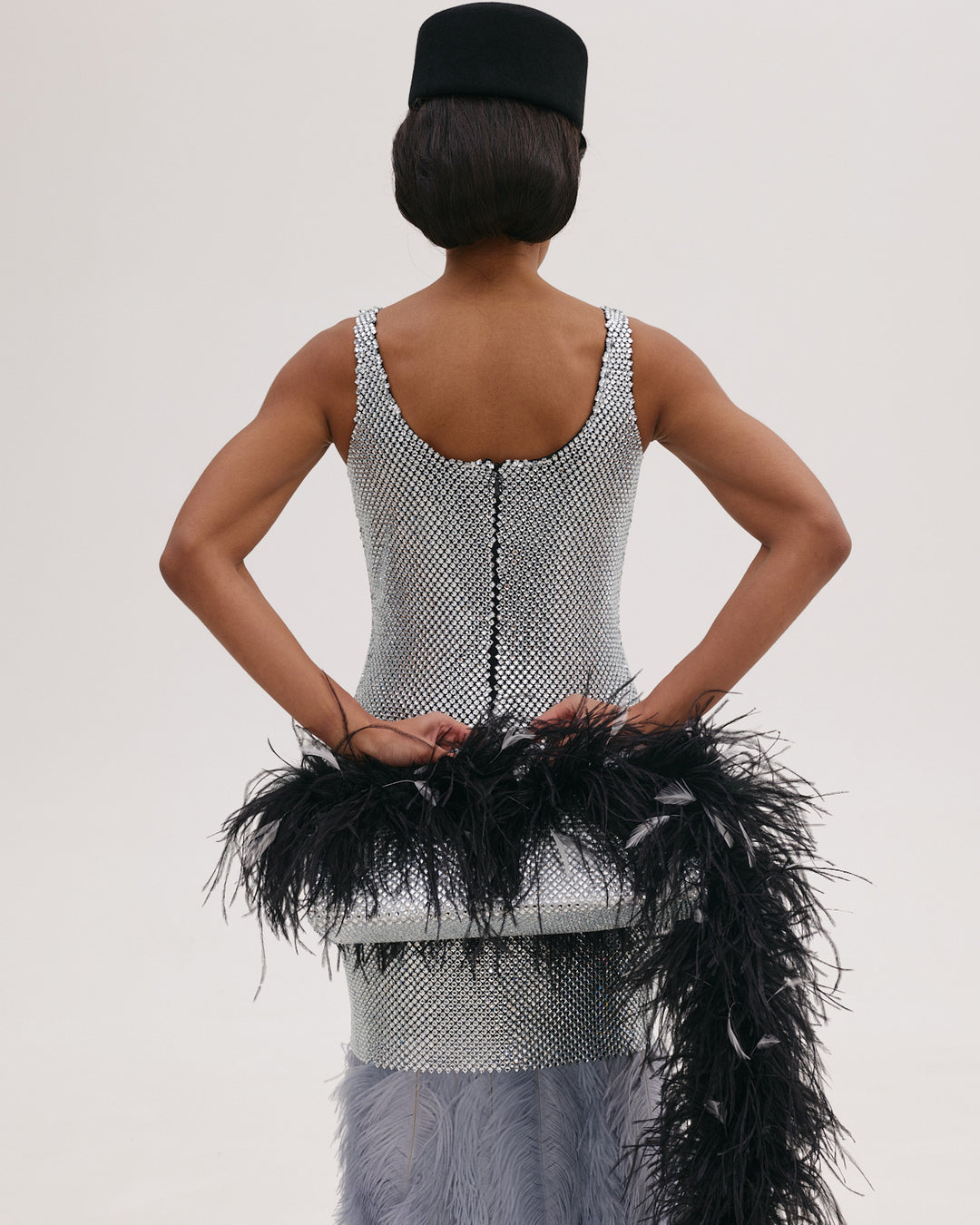 Silver Bag with Feather Tail