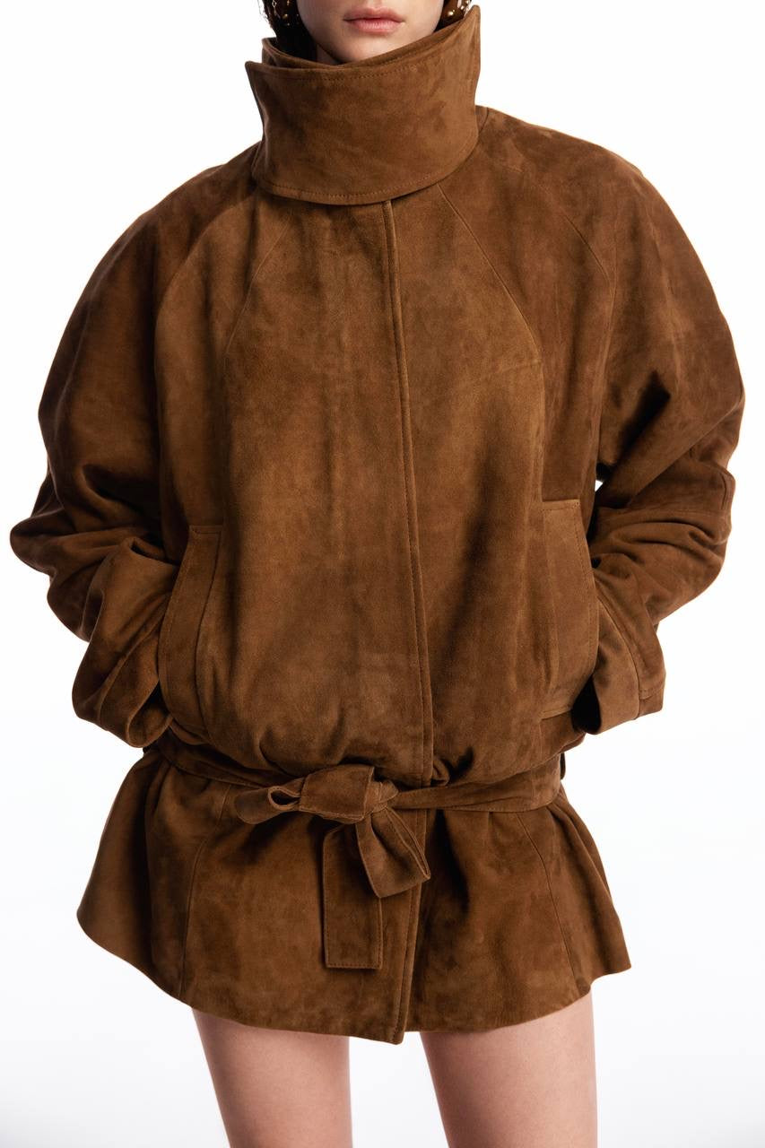 Suede oversized jacket with
silhouette lines